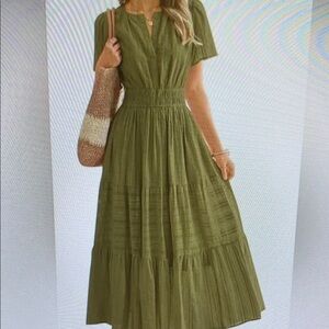 Elegant Red Midi Dress with Flowy Skirt and Sleeveless Design